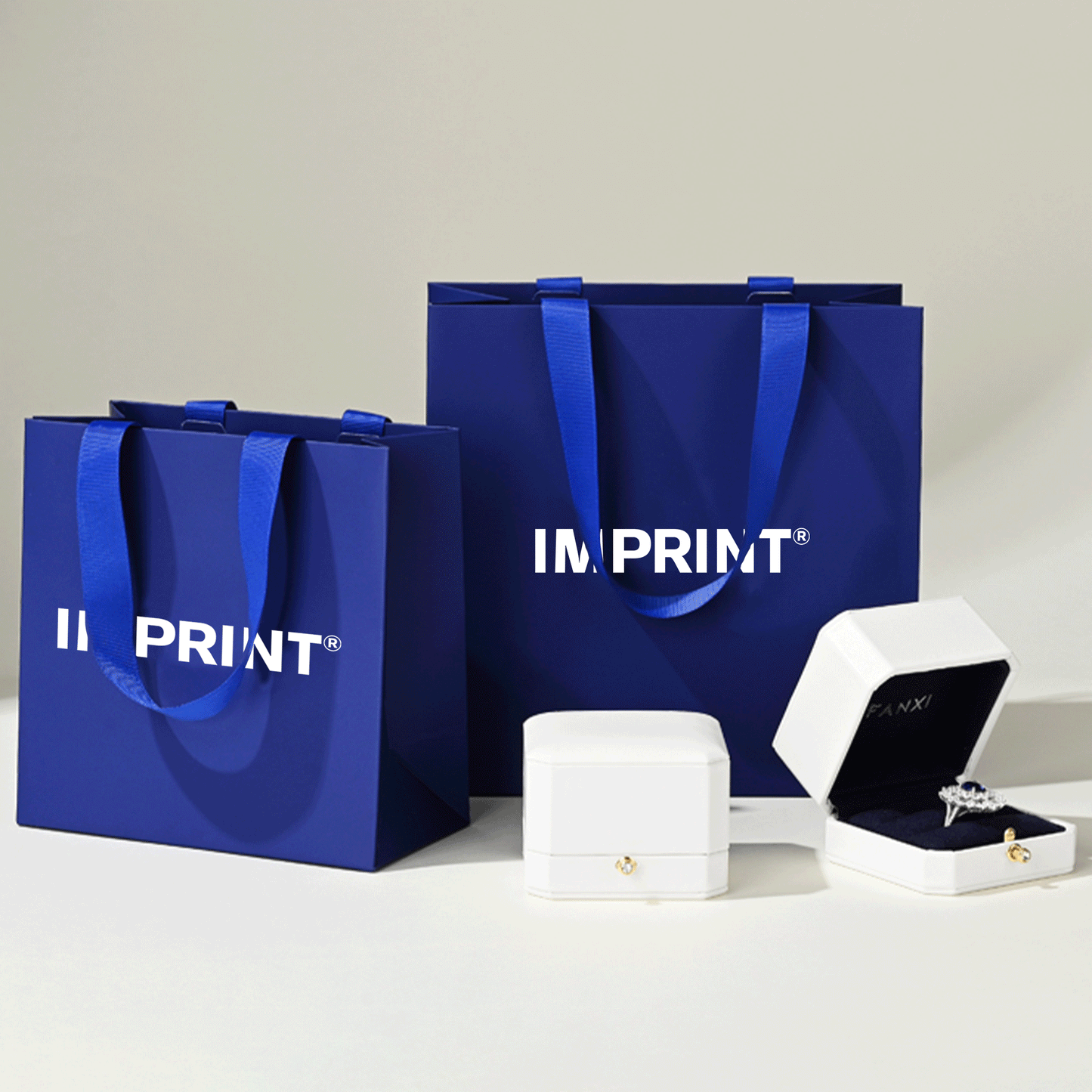Custom Deep Blue Laminated Paper Bag with Grosgrain Handles – IMPRINT®