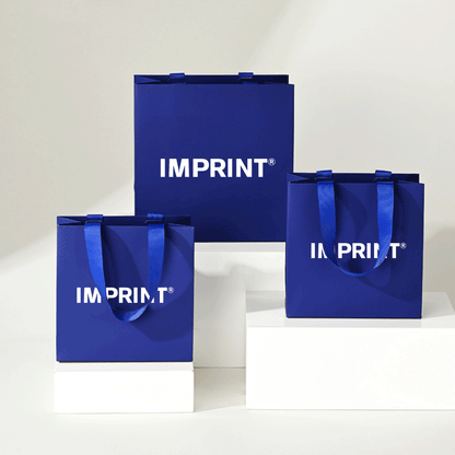 Custom Deep Blue Laminated Paper Bag with Grosgrain Handles – IMPRINT®