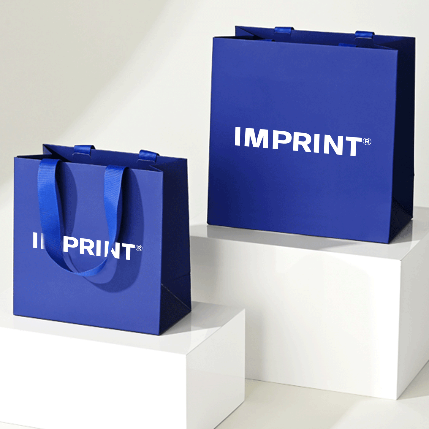 Custom Deep Blue Laminated Paper Bag with Grosgrain Handles – IMPRINT®